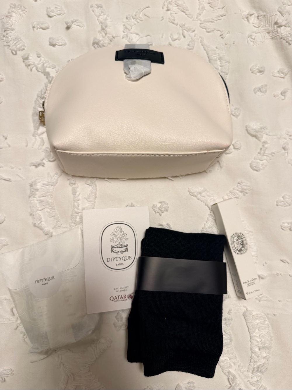 diptyque Cream Pebbled Leather Cosmetic Pouch with unopened beauty items